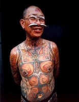 Tatuaje en Hombre Chino